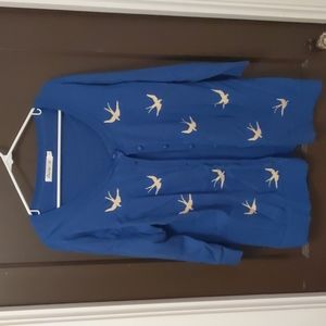Blue button up cardigan with swallows